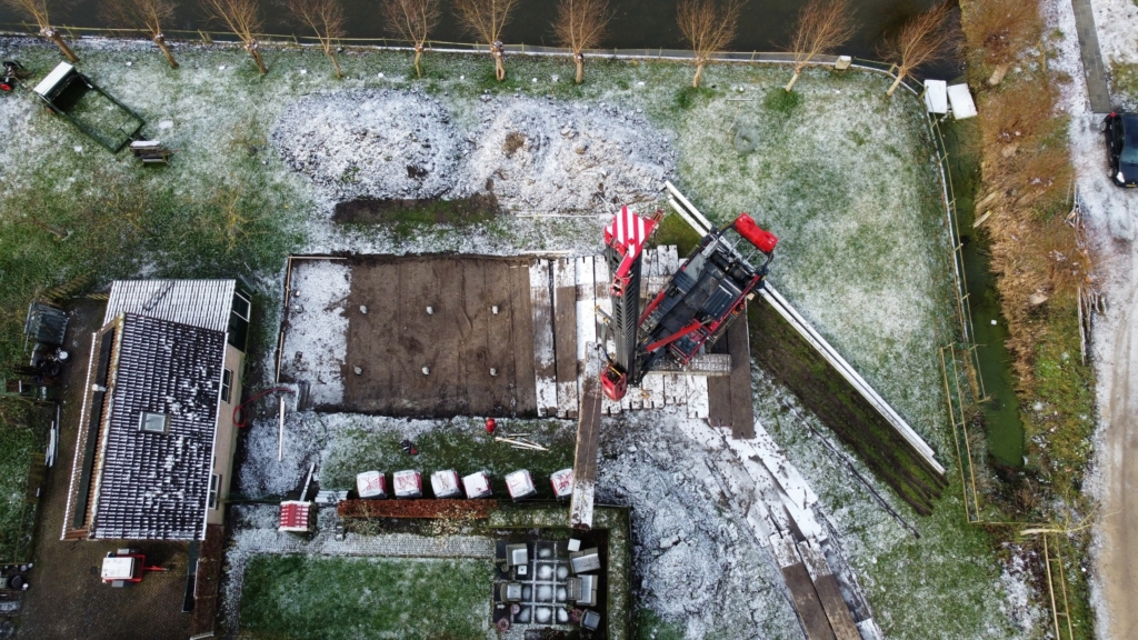 Holzschuppen auf vorgefertigten Pfählen